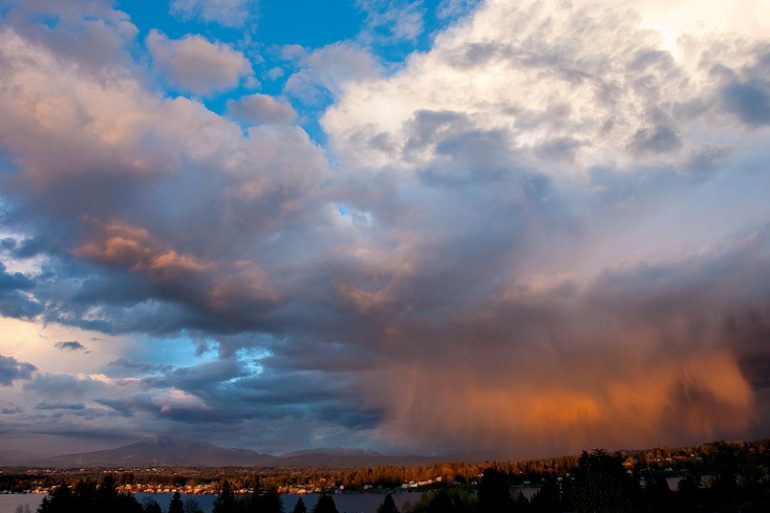 Rain and clouds highlighted by the evening sun, Lake Stevens, WA.