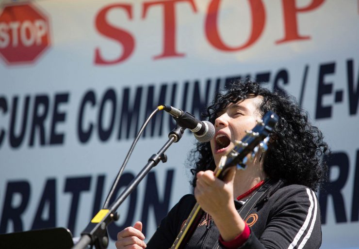 protest singer, may day, seattle 2013