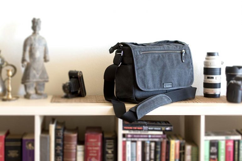 Tenba Cooper Series 13 DSLR Bag on book case.