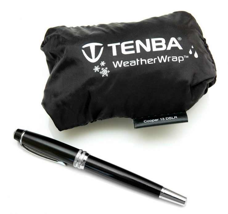 Tenba Cooper 13 Rain Fly in Pouch, with a pen