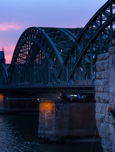 Rock climbing in Cologne, Germany, along the Rhein River.