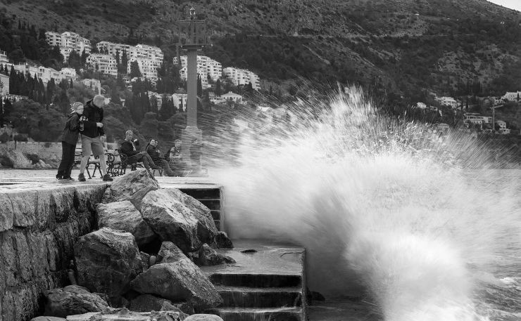 Waves on the edge of the old harbor in Dubrovnik