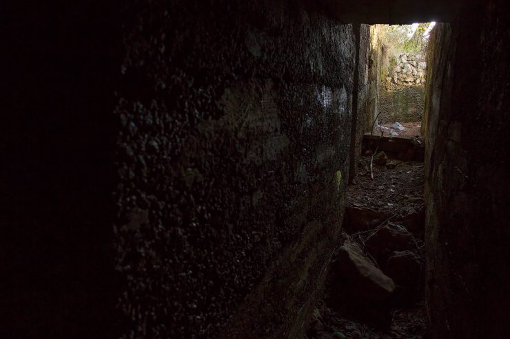 In one of the old bunkers. A tunnel to the left led to an empty storage room.