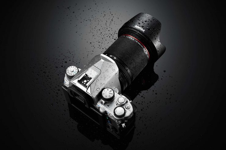 Pentax KP covered in water droplets