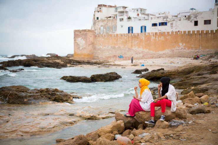 Moroccan school girls on beach.