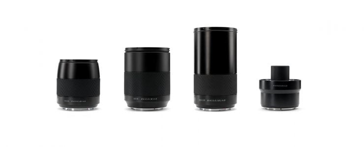 Product photo of three new lenses and teleconverter