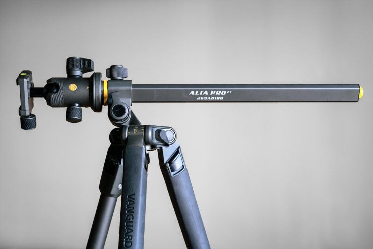 The Vanguard Alta Pro 2+ tripod against a grey background with the center column adjusted horizontally